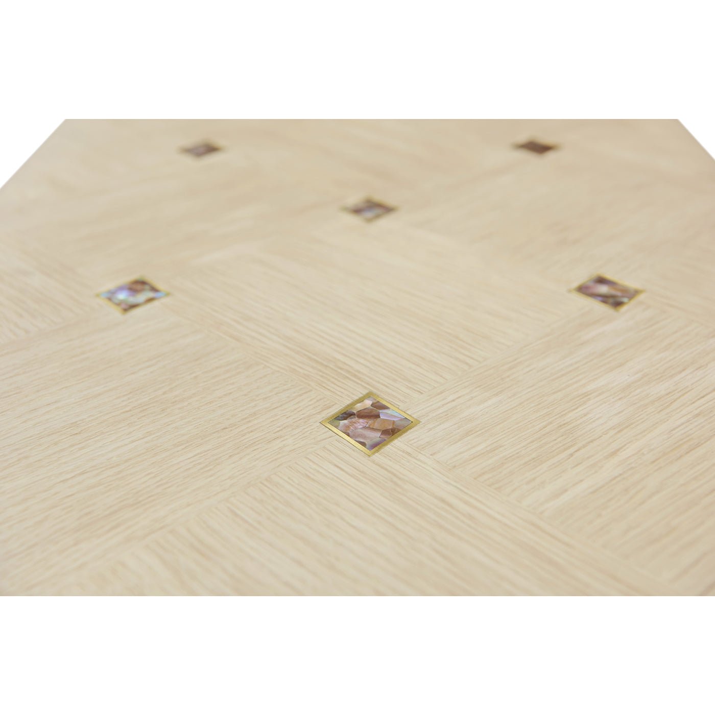 Close-up of diamond pattern detail on console table.