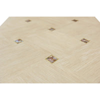 Close-up of diamond pattern detail on console table.