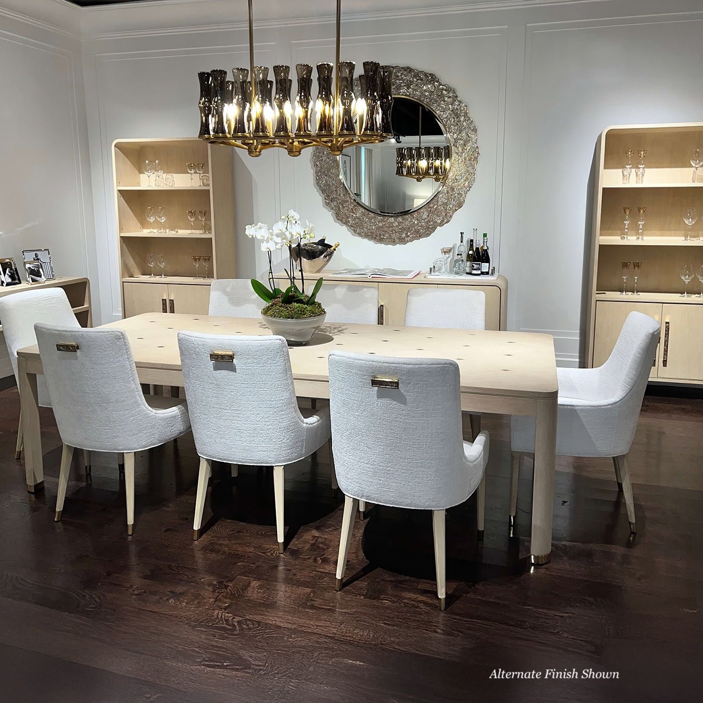 Dining table in elegant room, alternate light finish shown.
