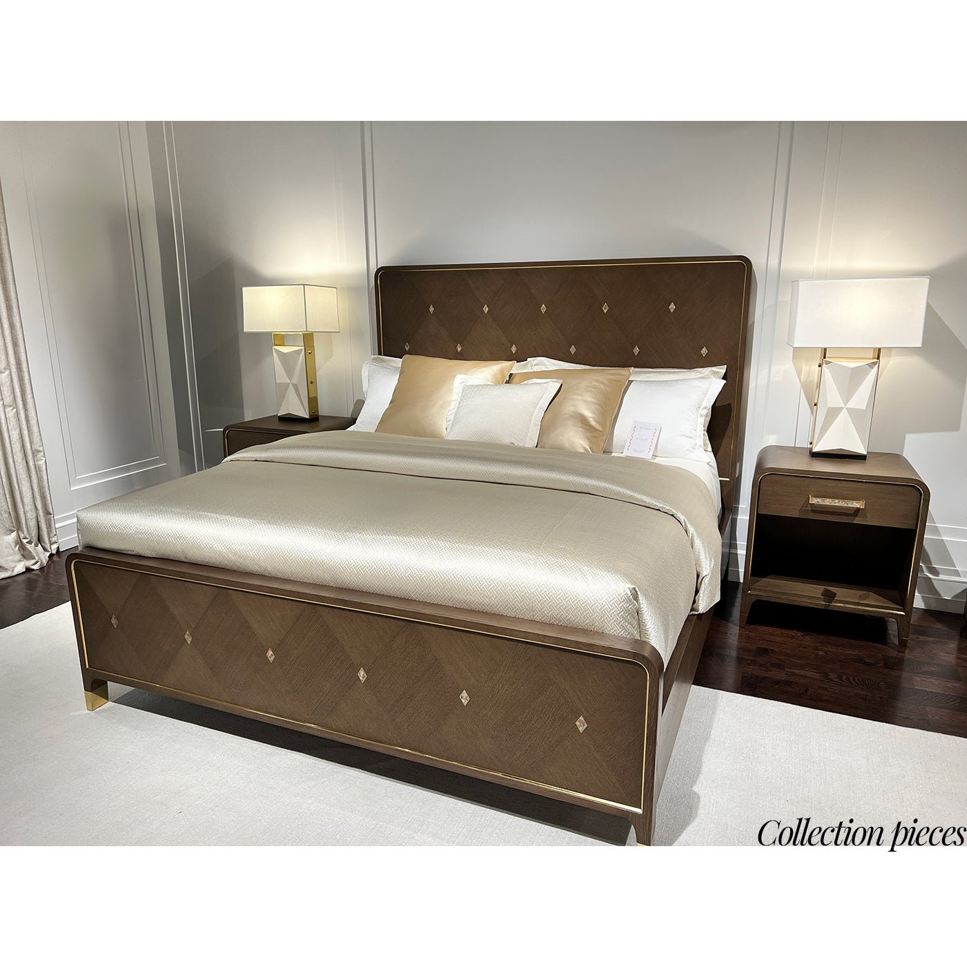 Bedroom set featuring dark wood dresser and bed.