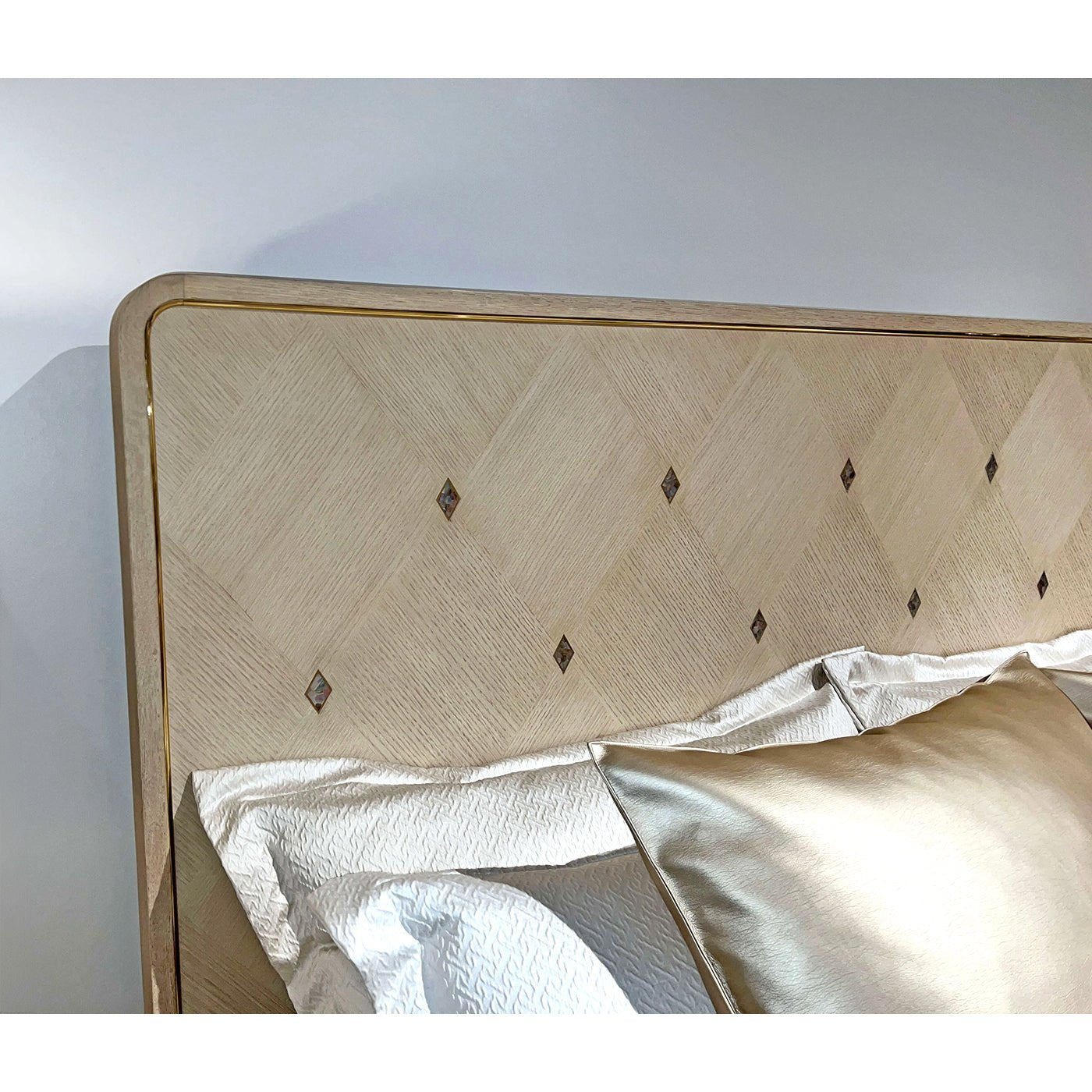 Close-up of headboard details, Hollywood Regency king bed.