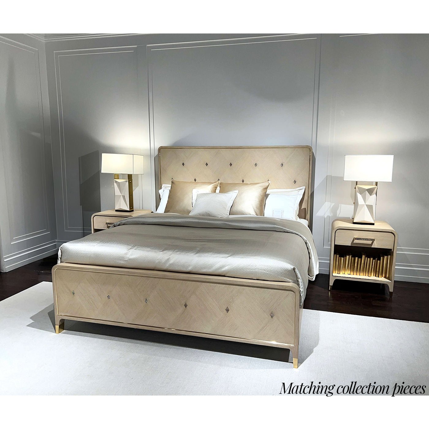 Bedroom set with matching light finish bed and nightstands.