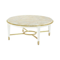 Round cocktail table with gold trim, side view