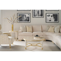 Elegant room setup featuring round side table centerpiece.