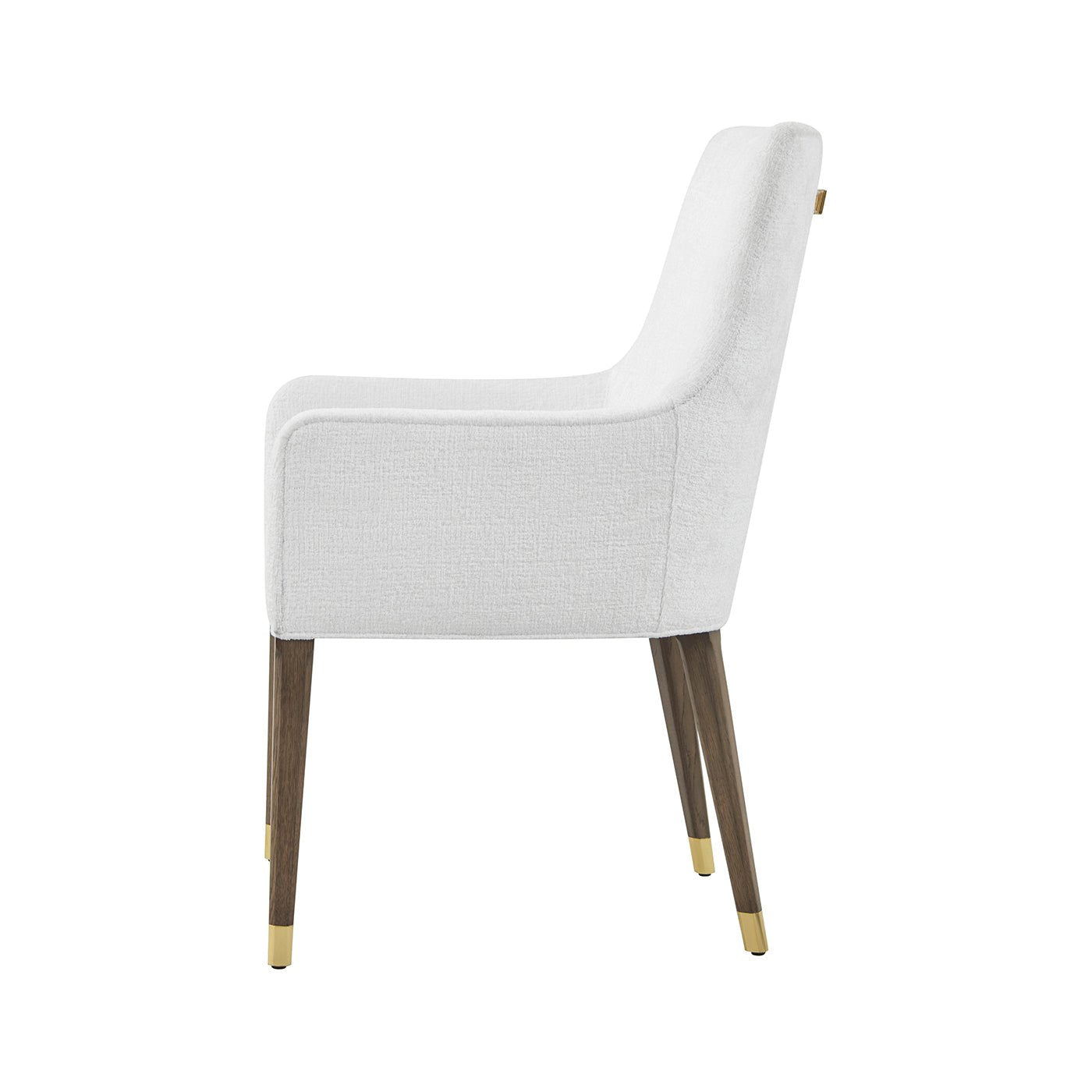 Side view of upholstered armchair, wooden legs visible.