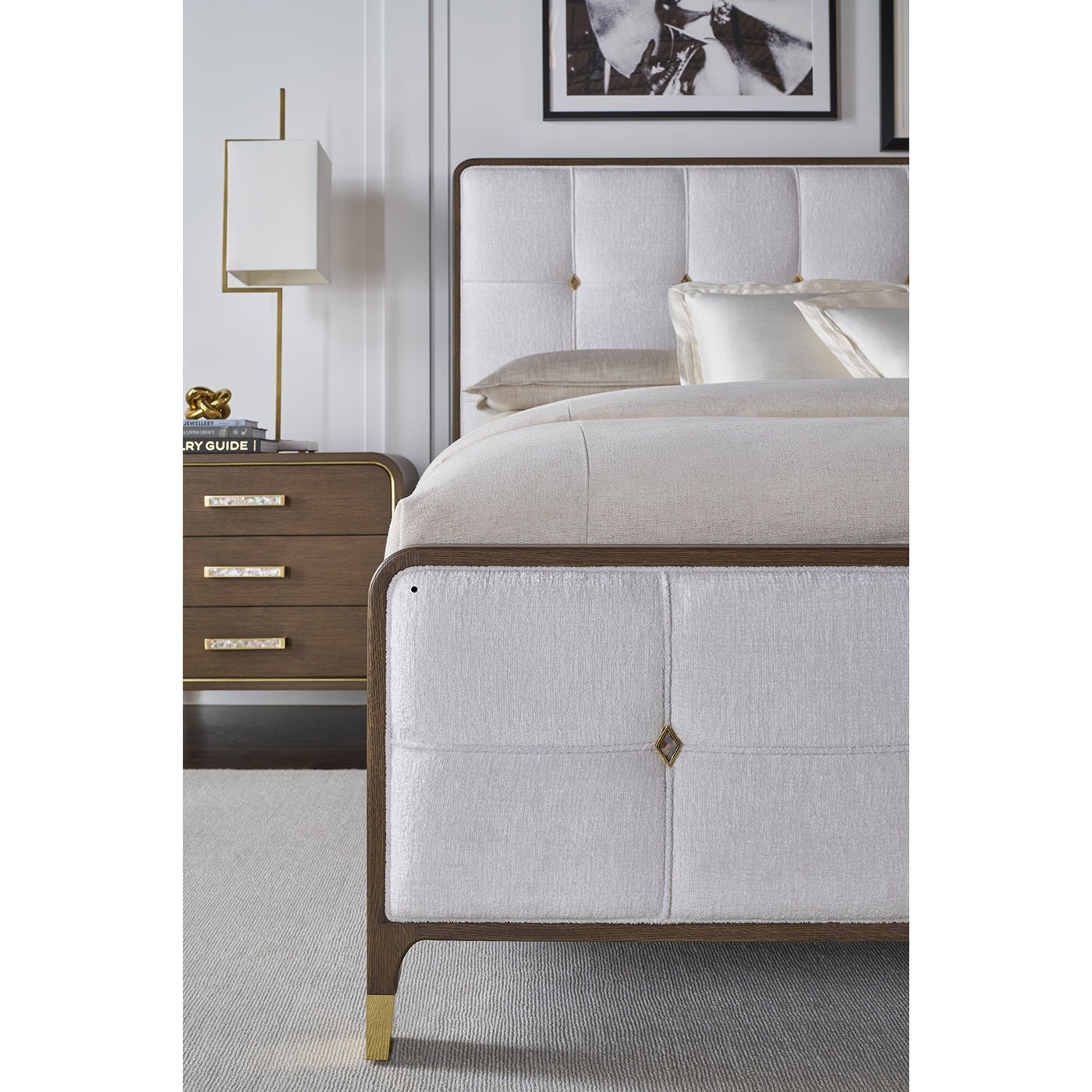 Front and side view of bed and nightstand.