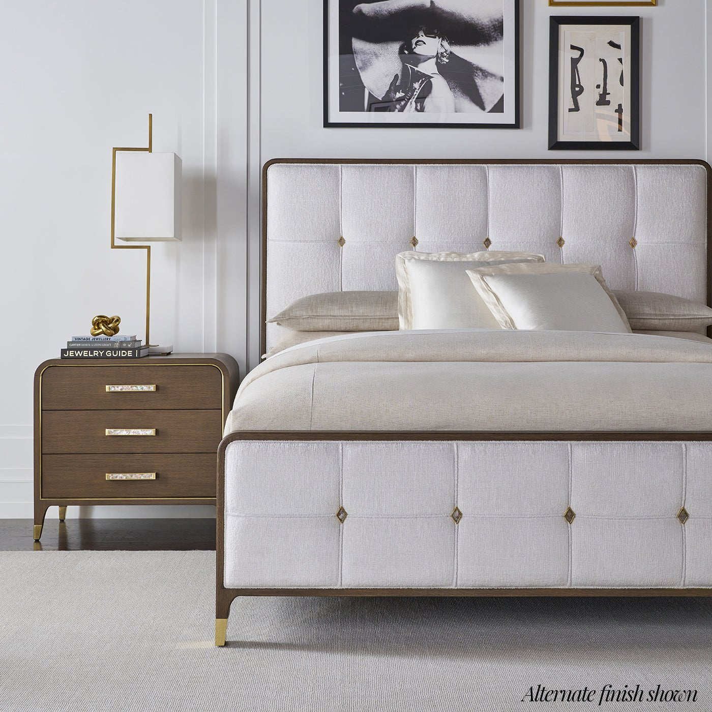 Alternate finish upholstered king bed and nightstand.