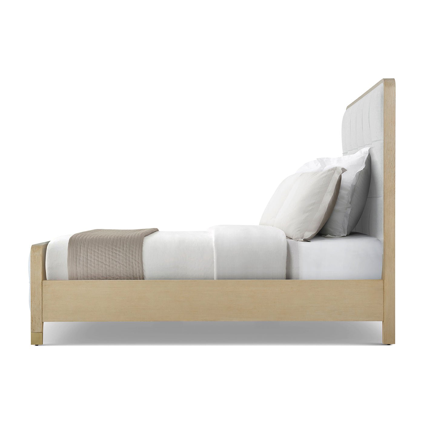 Light finish upholstered king bed side profile.