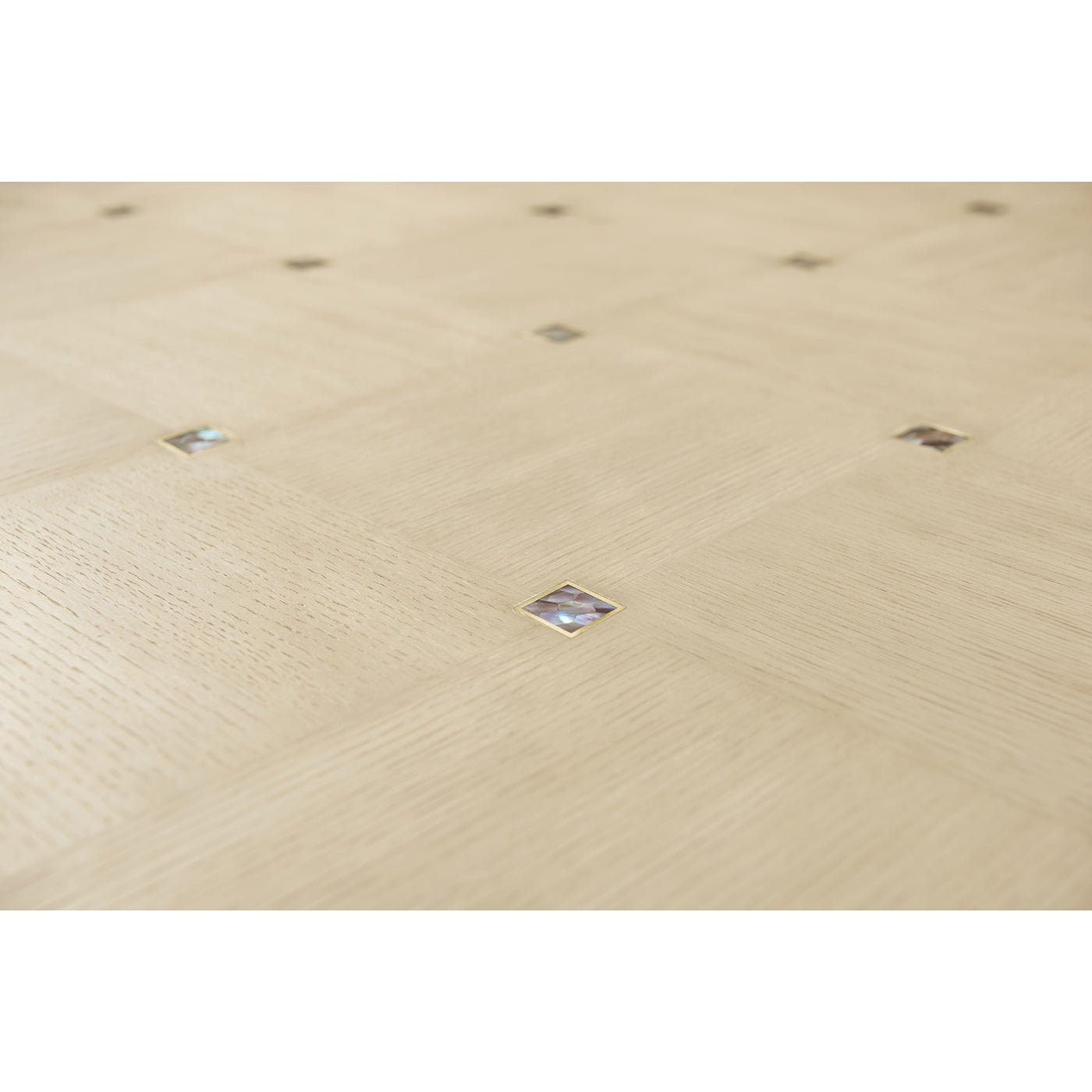 Detailed view of coffee table top with diamond inlays.