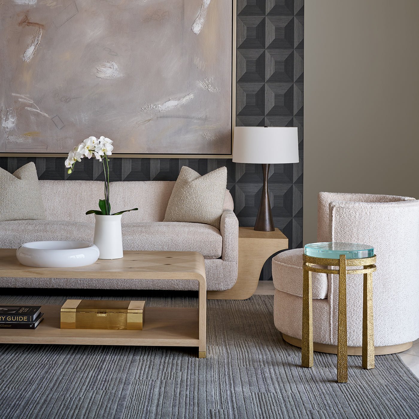 Coffee table in elegant room setting with decor.