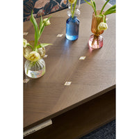 Top view styling with flowers on coffee table.