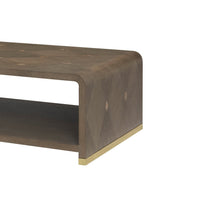 Corner angle of coffee table, gold trim detail.