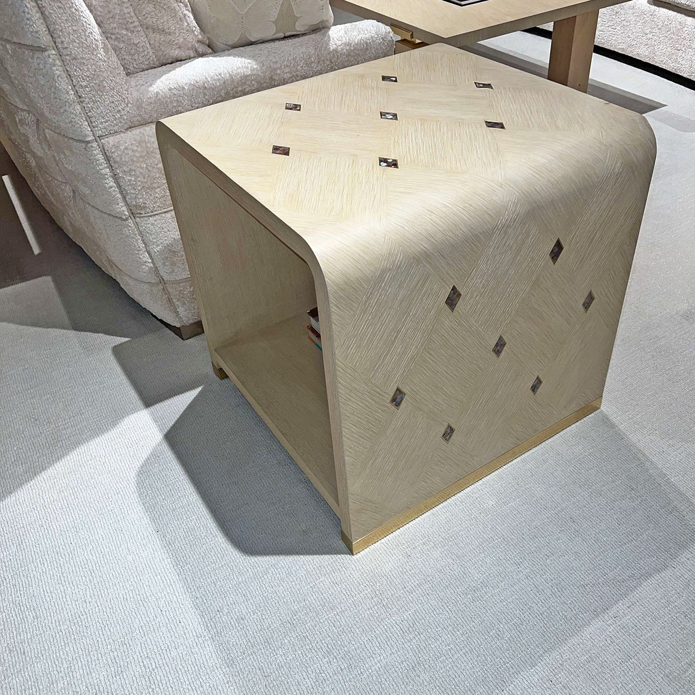 Aerial view of side table's surface and inlaid design.