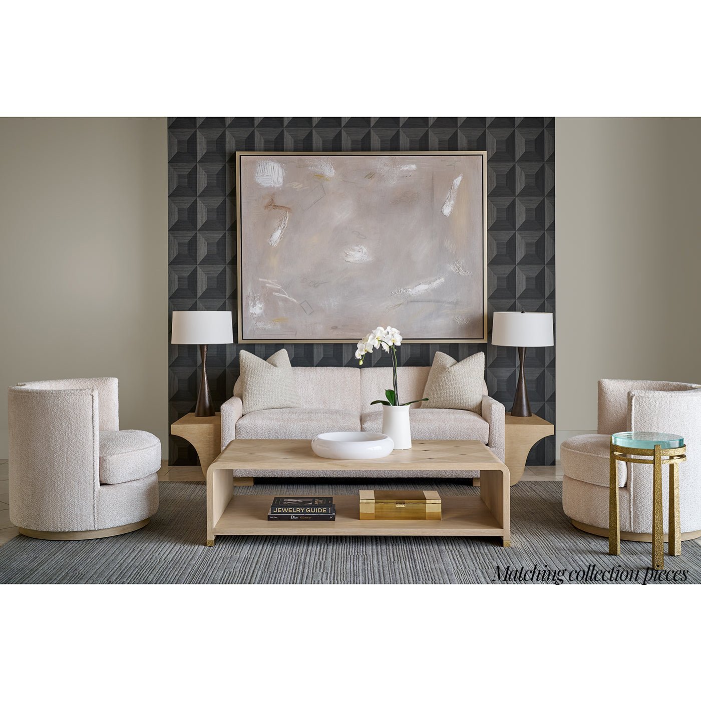 Living room with matching furniture and neutral tones.