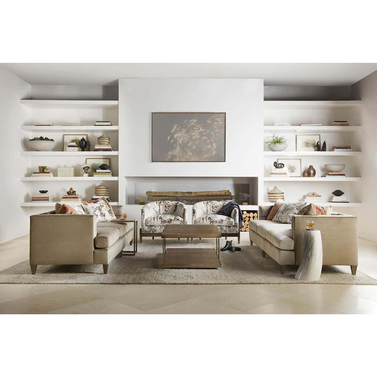 Living room with horn drink table and beige furniture.