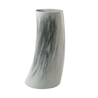 Gray horn drink table with curved design, side view.