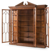 Open view of walnut display bookcase with shelves.