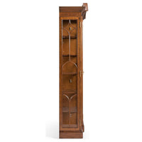 Side view of detailed walnut display bookcase.