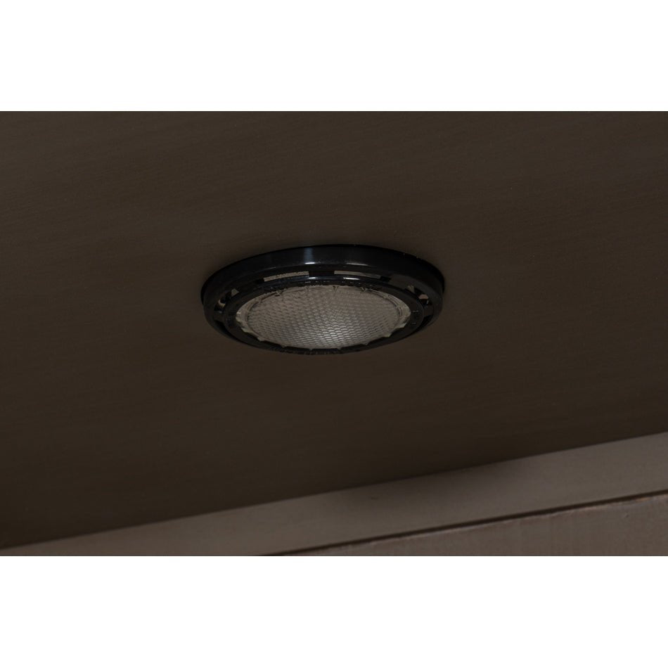 Interior light fixture in industrial bar cabinet.