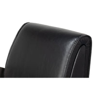 Industrial armchair, close-up of the leather backrest.