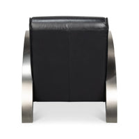 Industrial black leather armchair, rear view.