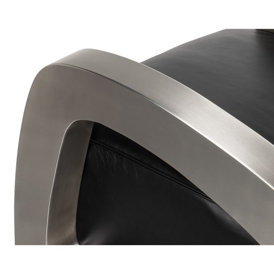Industrial armchair, detailed look at metallic armrest.