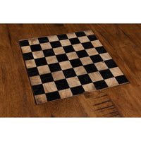 Chessboard design on wooden coffee table top.