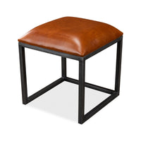 Single leather stool for industrial coffee table set.