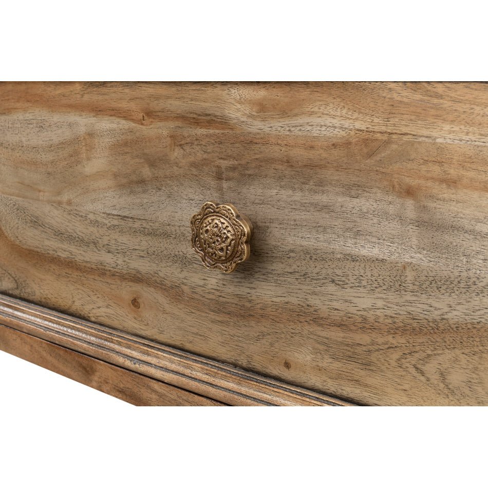 Equestrian console table, close-up of ornate drawer knob.