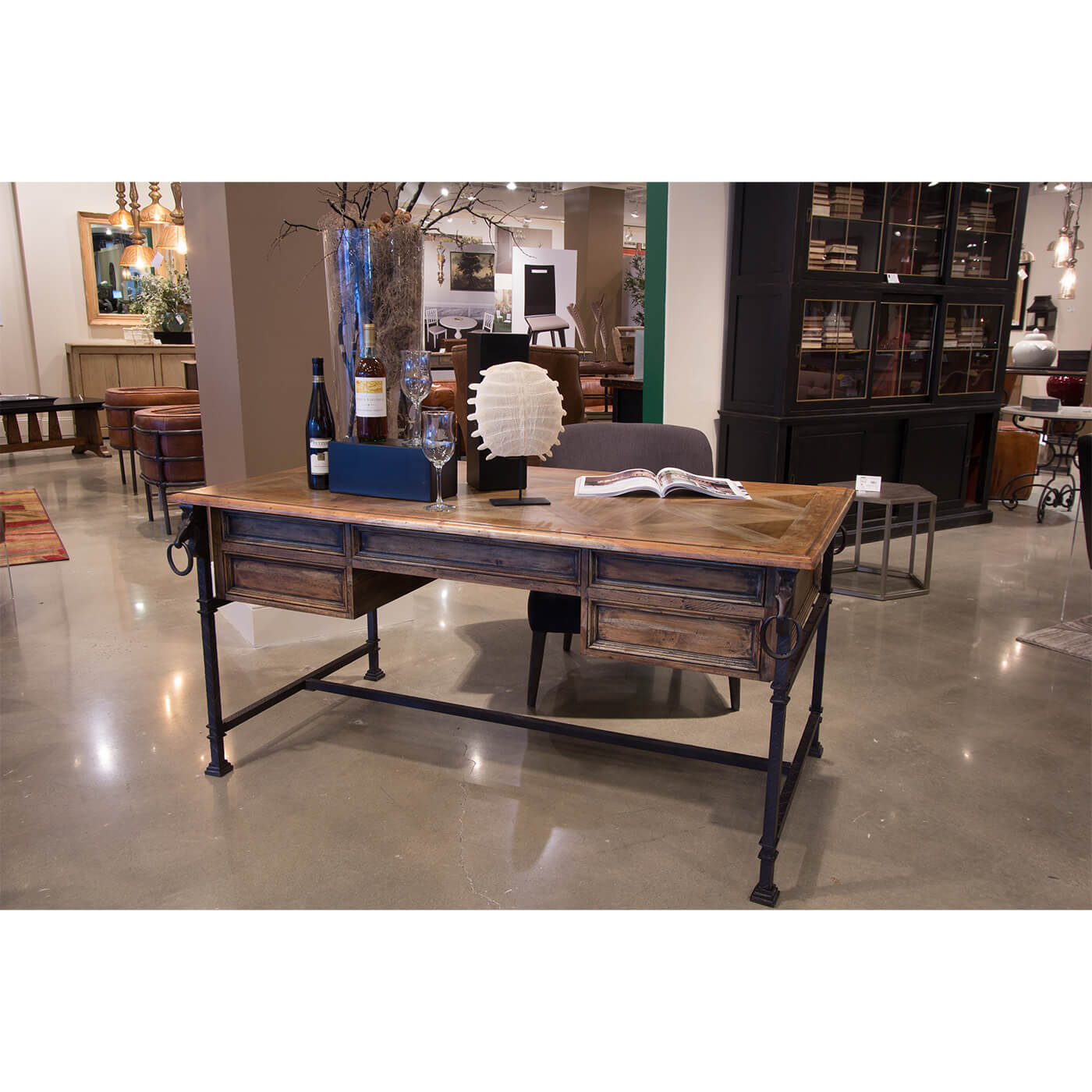 Industrial equestrian desk in modern showroom setting.