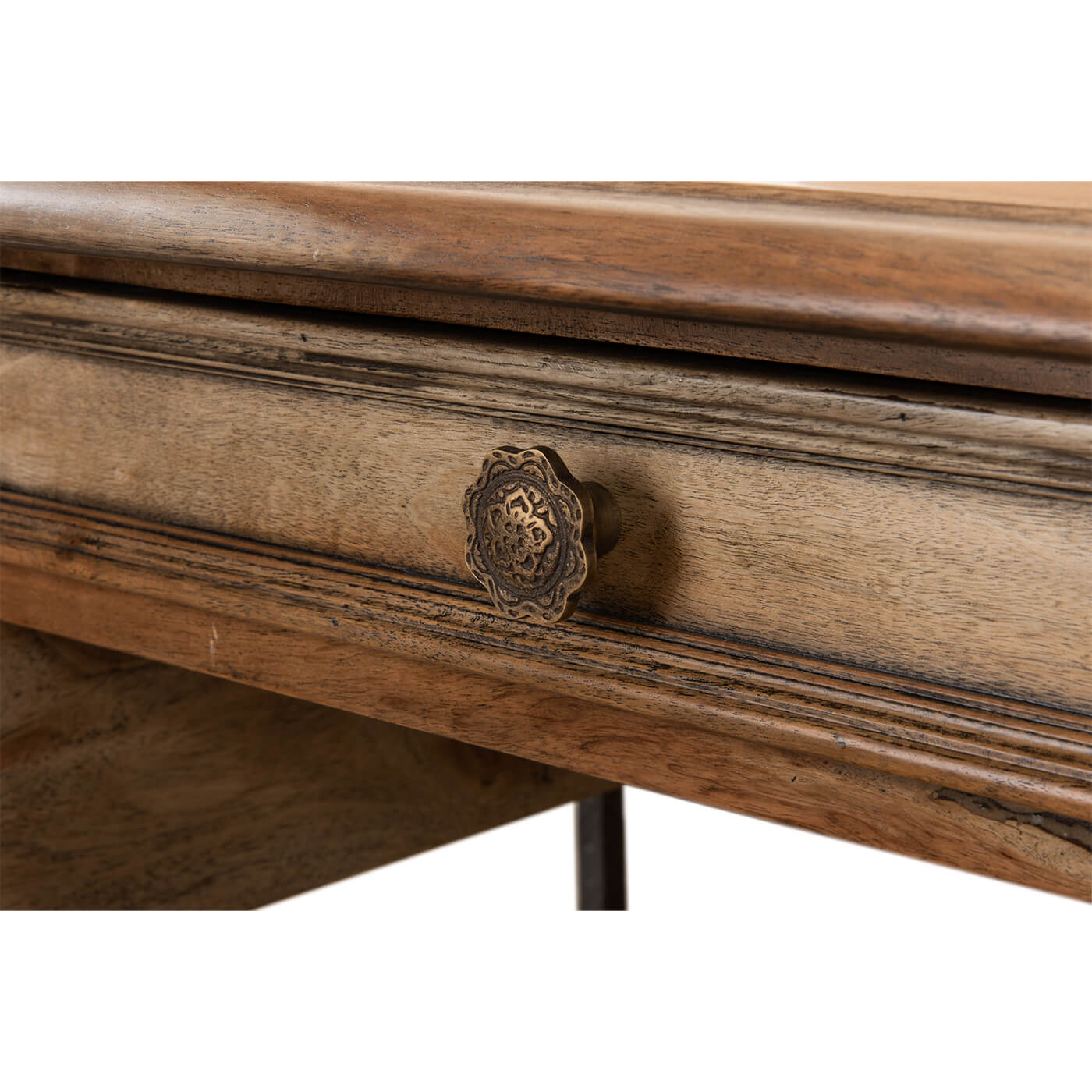 Close-up of industrial equestrian desk's ornate drawer knob.