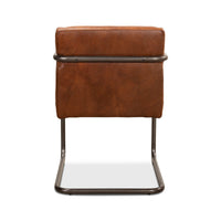 Back view of industrial leather armchair, showing leather detail.