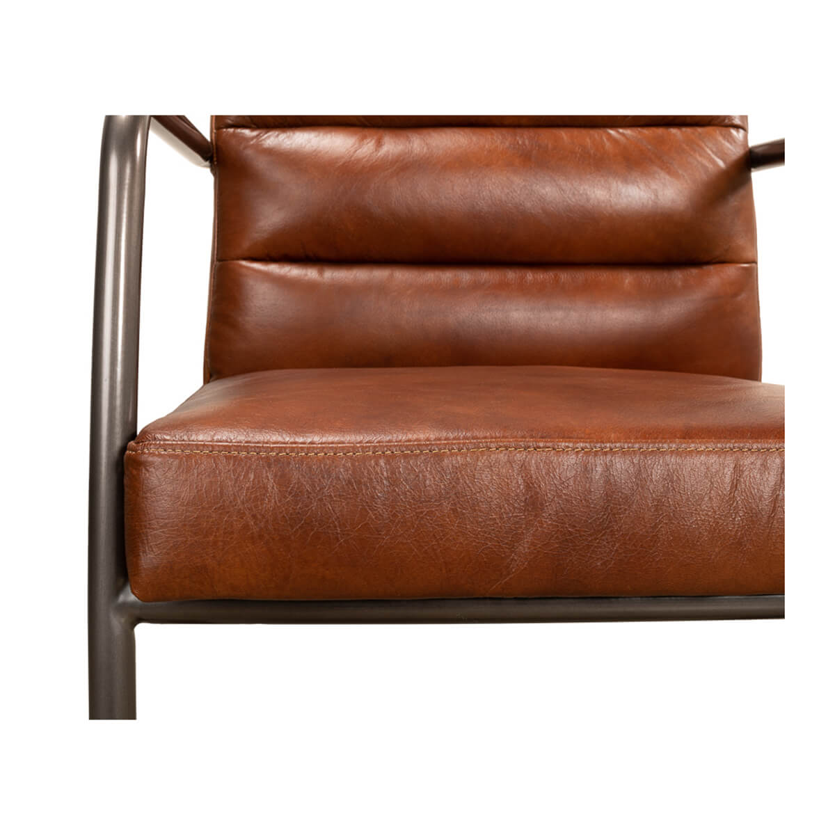 Close-up of industrial leather armchair, seat and back cushions.
