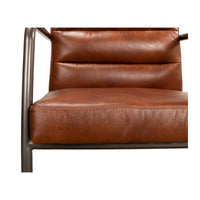 Close-up of industrial leather armchair, seat and back cushions.