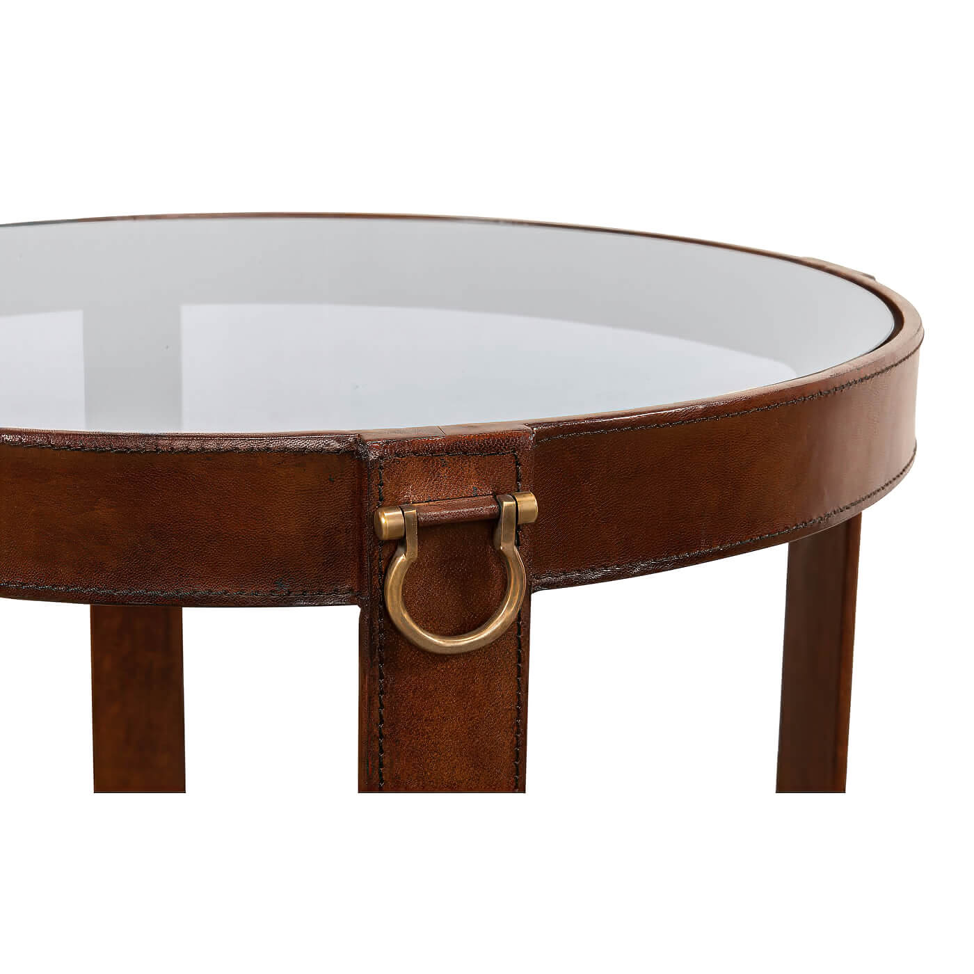Close-up of leather end table detailing with metal ring.