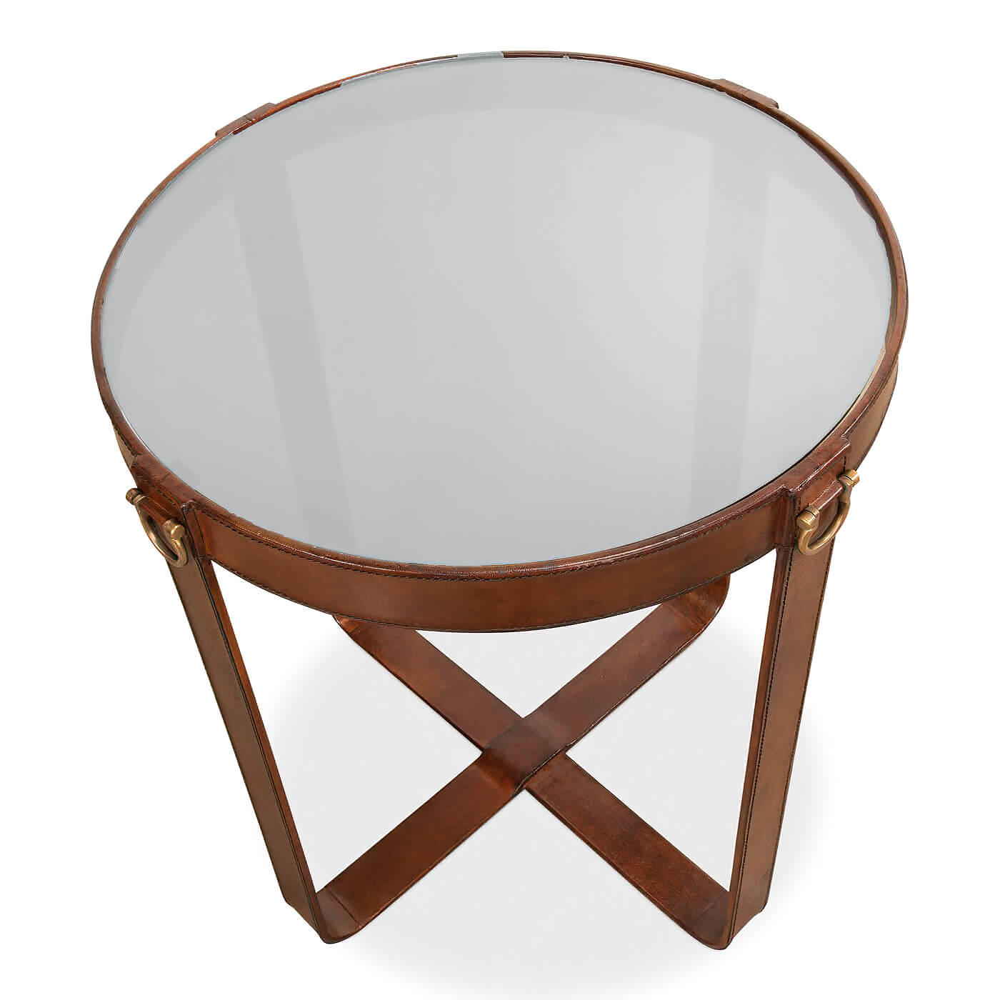 Top view of round leather end table displaying glass surface.