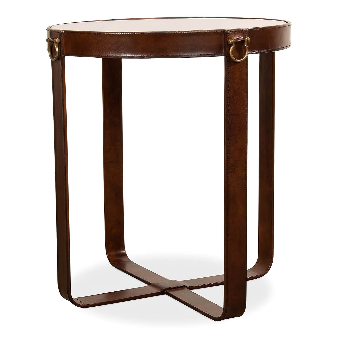 Angled view of round leather end table with metal accents.