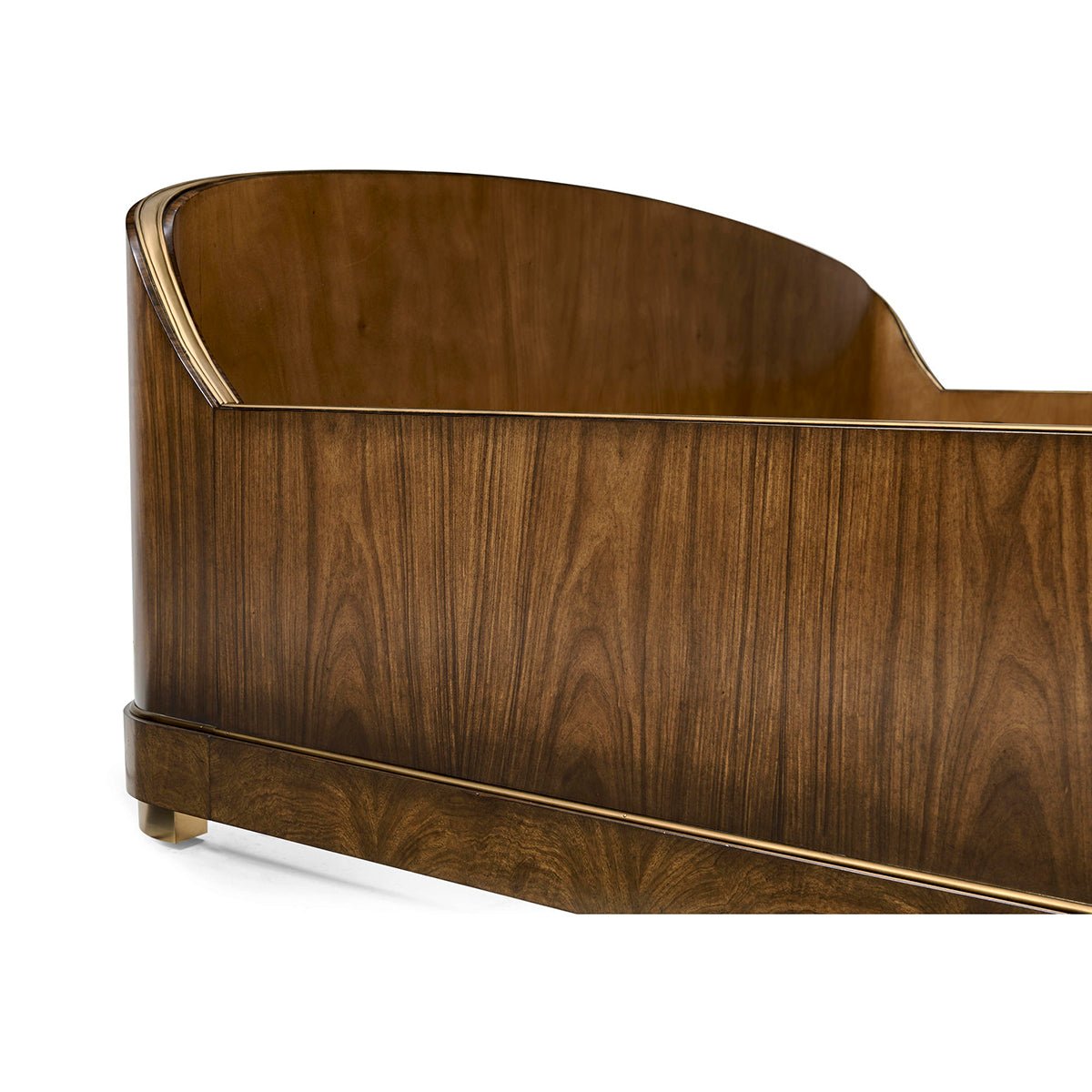Footboard detail of wooden king bed frame.