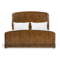 Front view of wooden king bed with headboard detail.