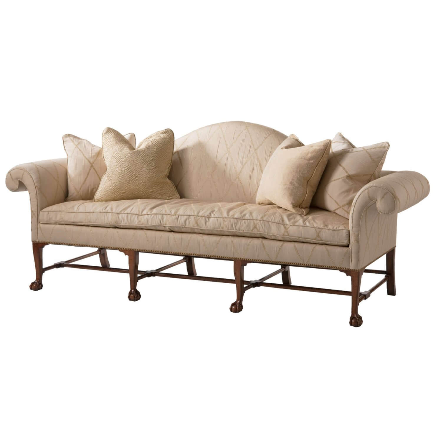 Elegant Irish Camelback Sofa with plush cream cushions