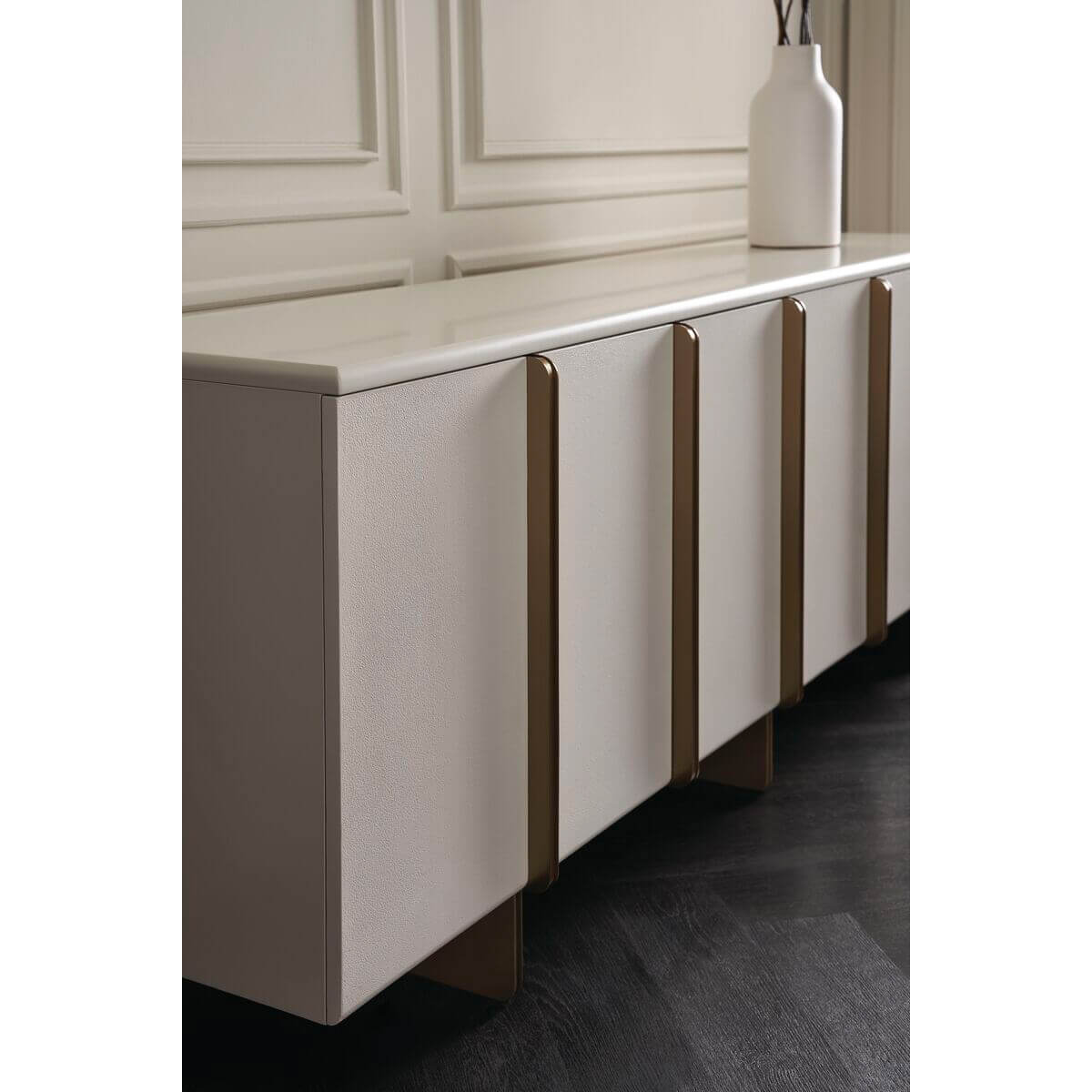 Close-up of Italian Art Deco sideboard, modern detailing.