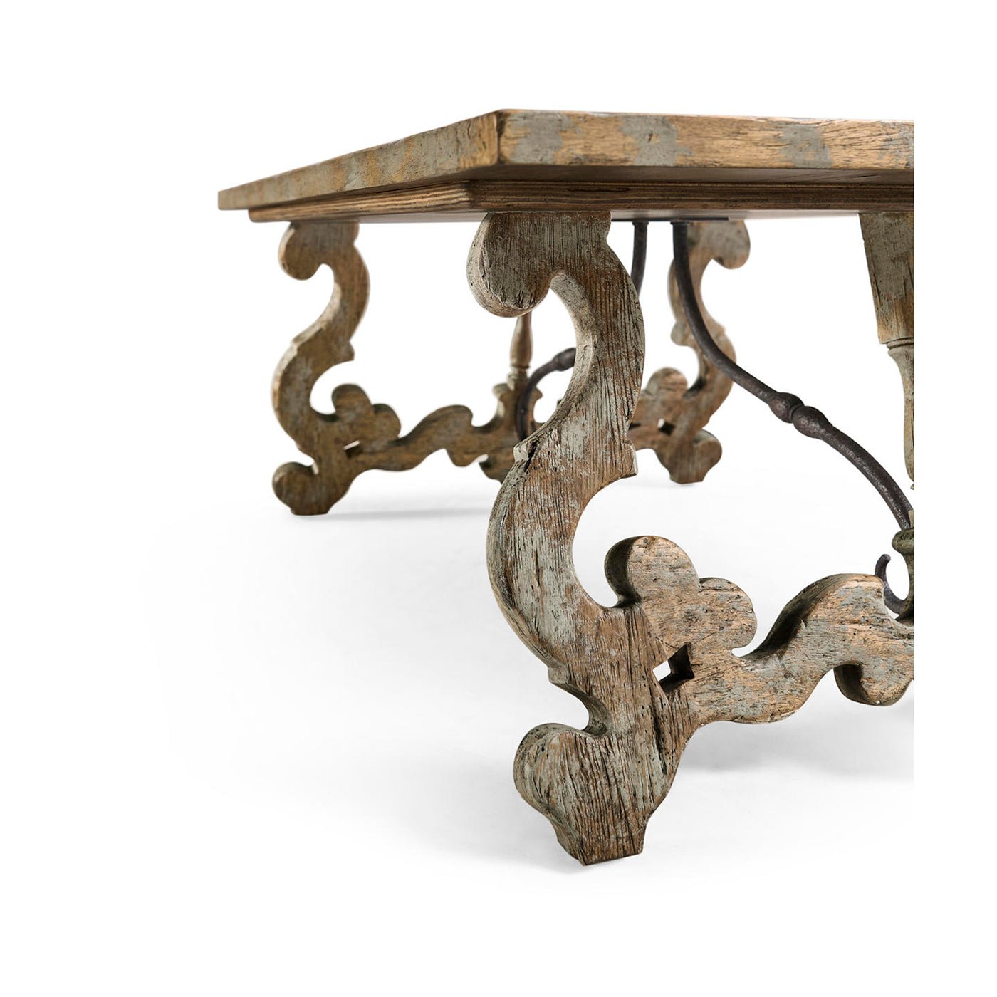 Close-up of ornate leg detail on oak coffee table.