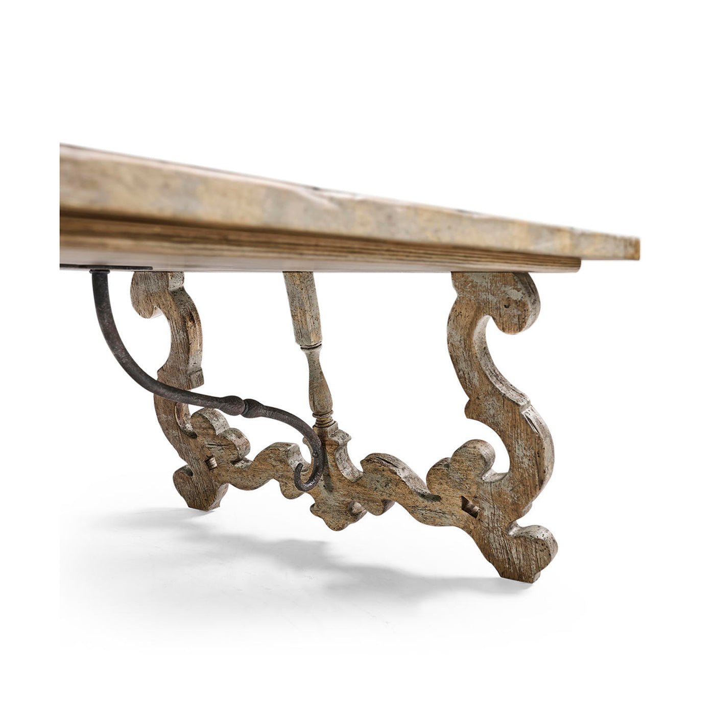 Underneath view, structural support and legs of oak table.