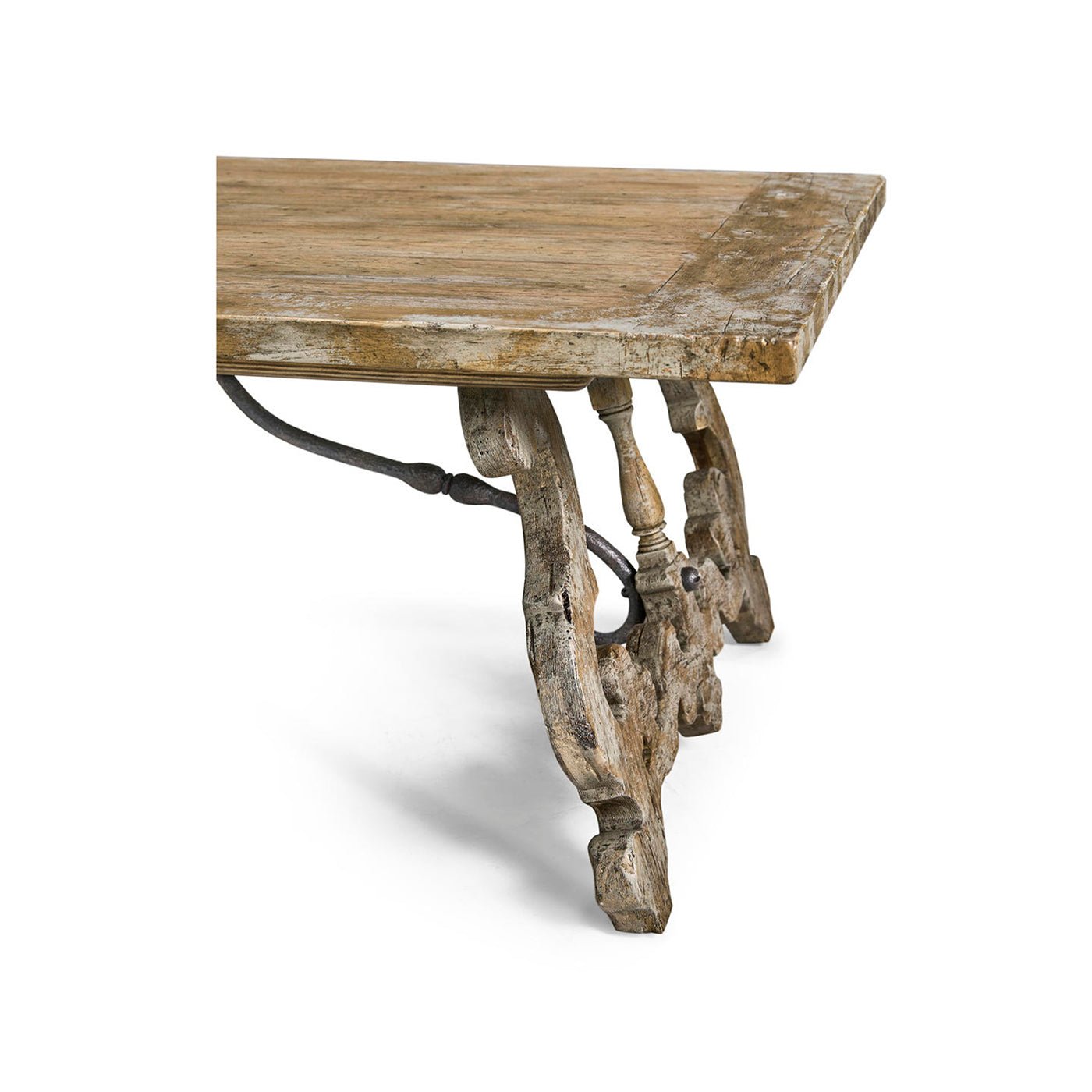 Oak coffee table corner, emphasizing leg craftsmanship.