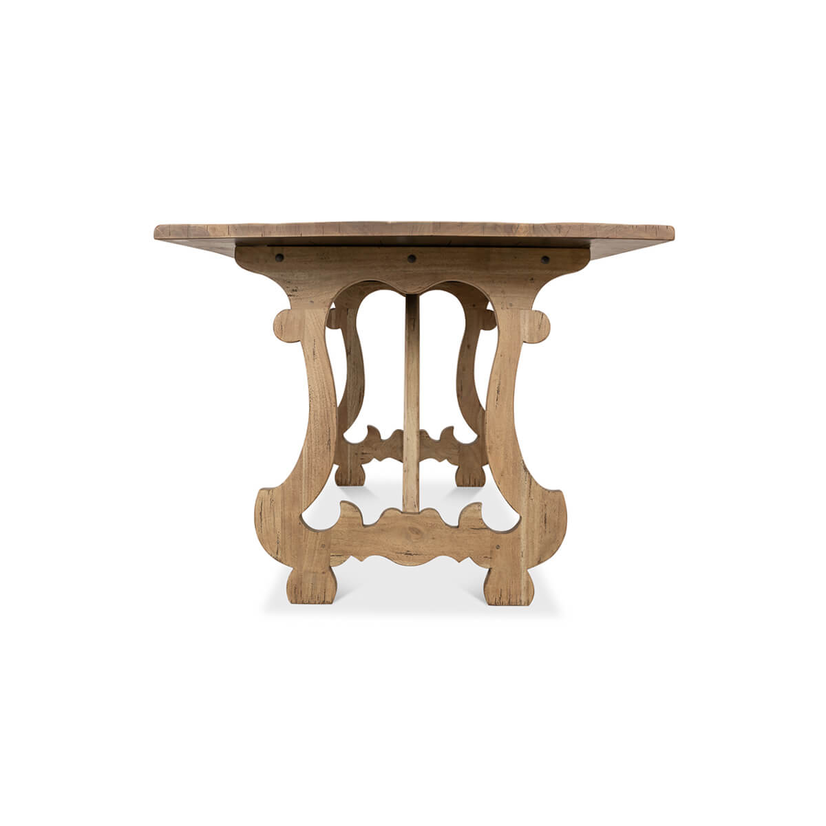 End view highlighting dining table's intricate leg design.