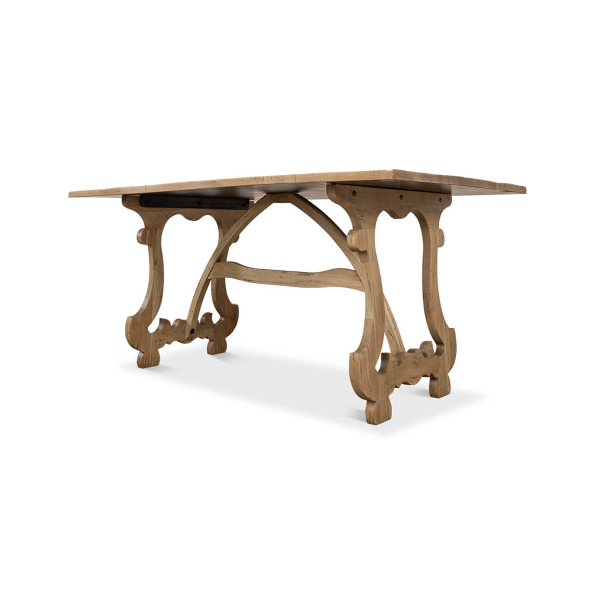 Angled view of dining table showcasing ornate base.