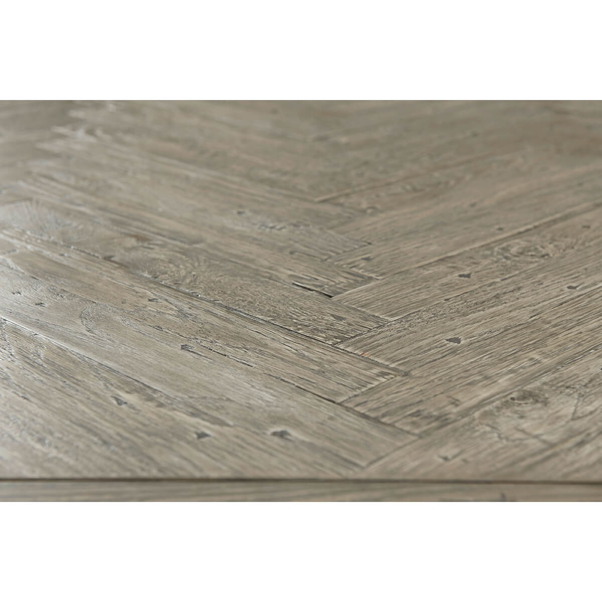 Herringbone pattern tabletop close-up detail.