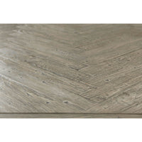 Herringbone pattern tabletop close-up detail.
