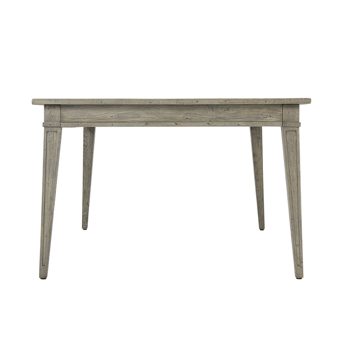 Side angle of grey oak dining table.