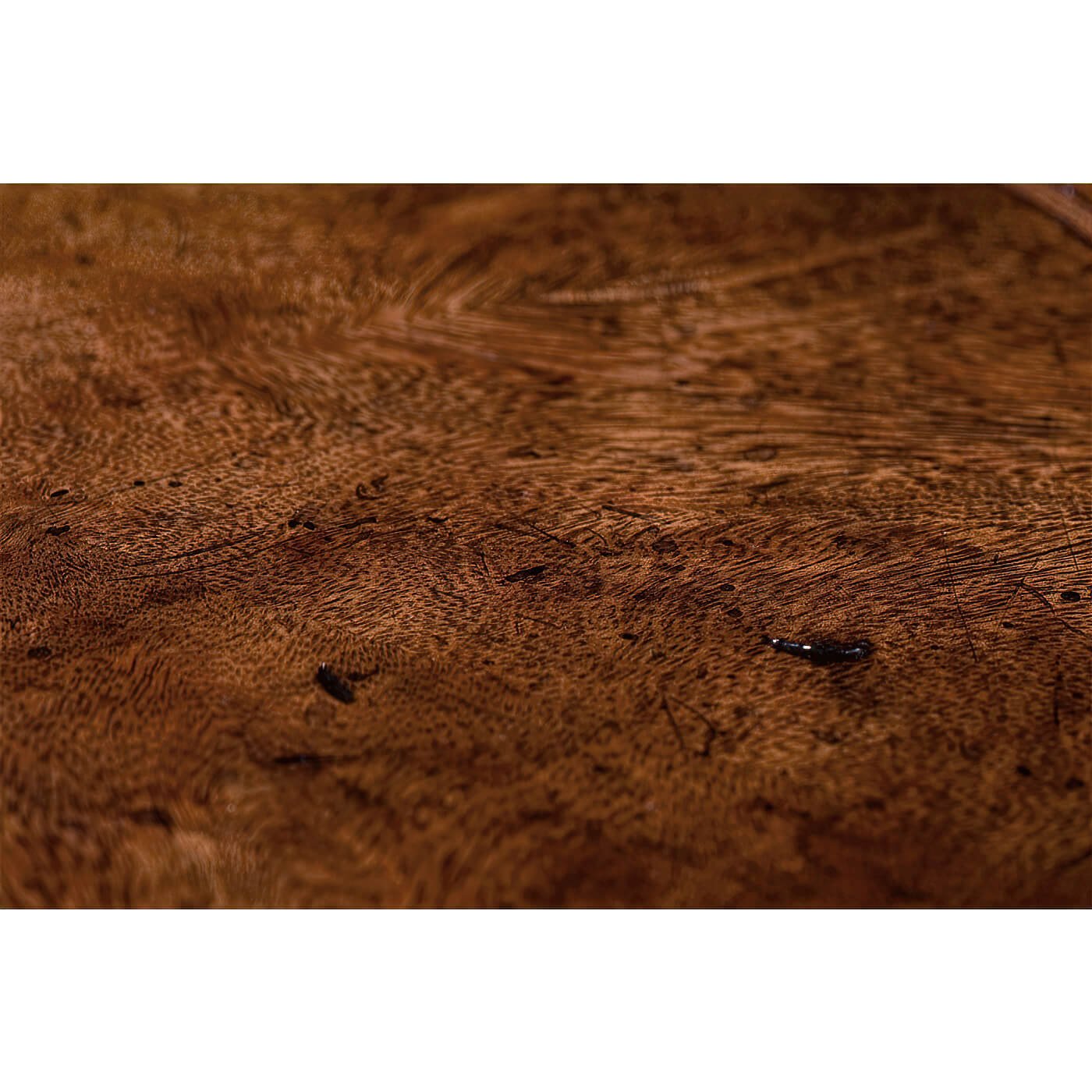 Detailed grain in wooden Italian lamp table top.